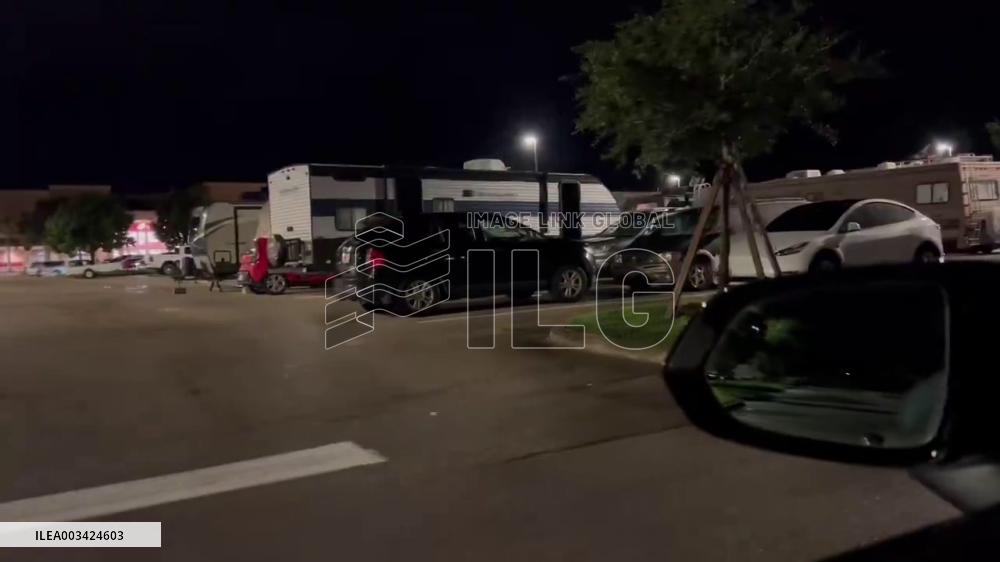 US: Residents Evacuate To High Ground Parking Lot In Florida Ahead Of Hurricane Milton