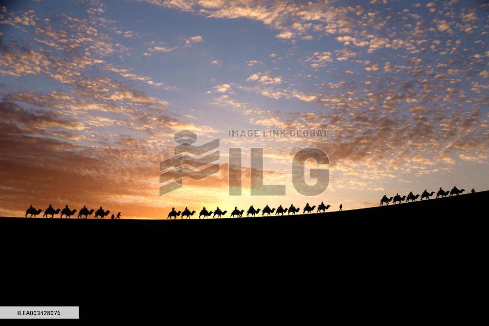 Tourists Visit The Mingsha Mountain - China