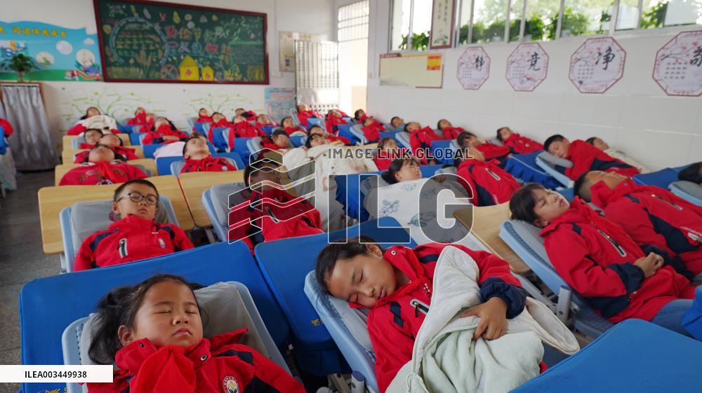 Students Nap in Enshi