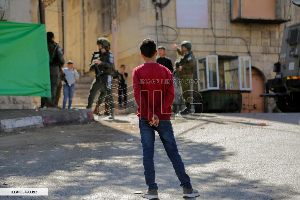 Settlers Storm The Old City Of Hebron - West Bank