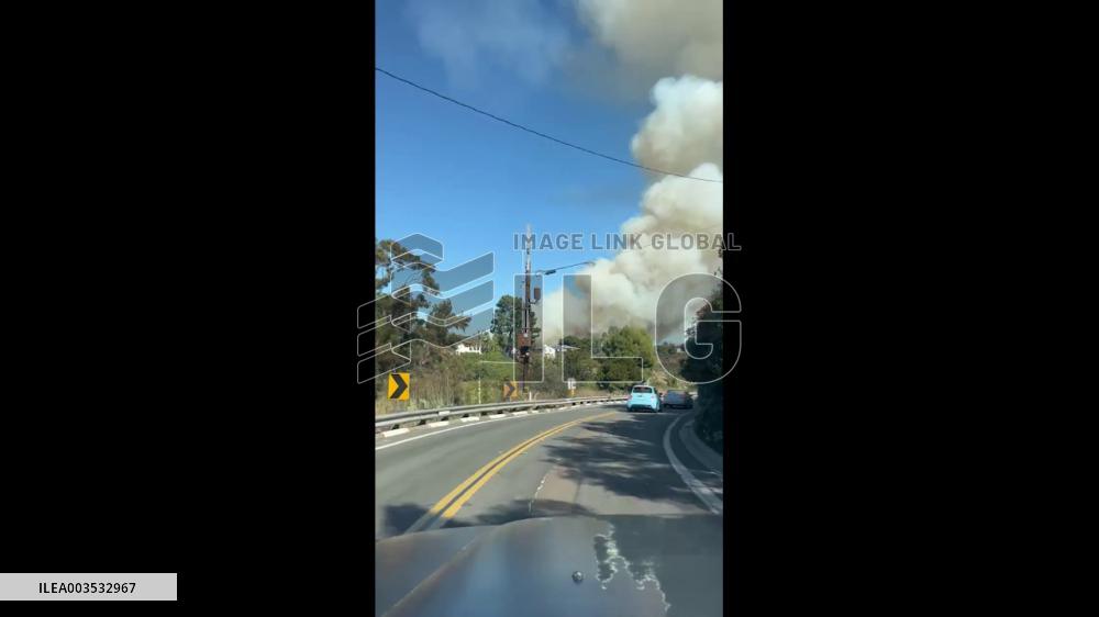 US: Wildfire Breaks Out Near College Area In San Diego, California 4