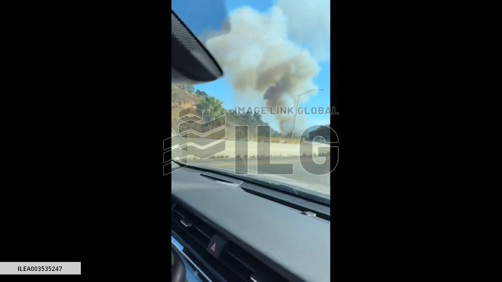 US: Wildfire Breaks Out Near College Area In San Diego, California 5