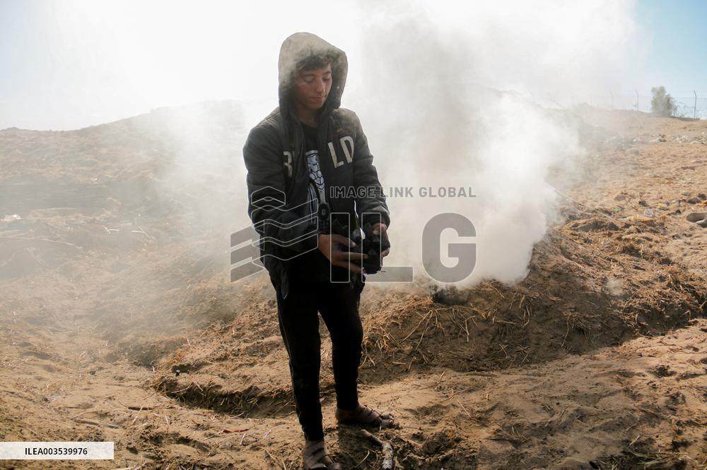 Workers Labor In A Coal-Making Pit - Gaza