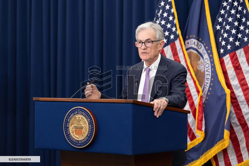 Fed Cuts Interest Rates By A Quarter Point - Washington