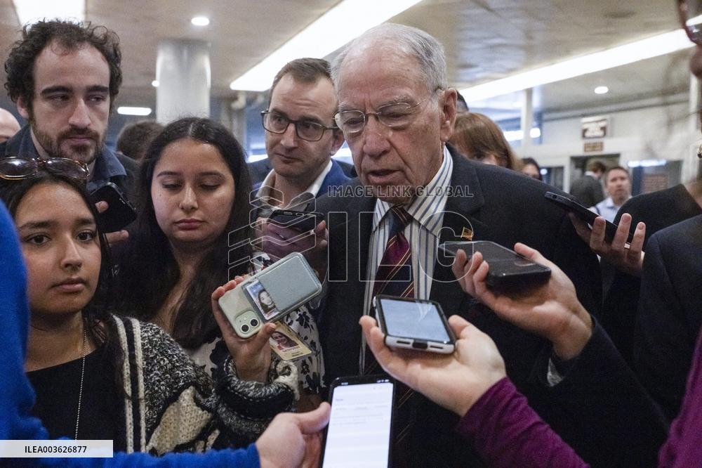 Senators Walk Past Reporters In Capitol - Washington
