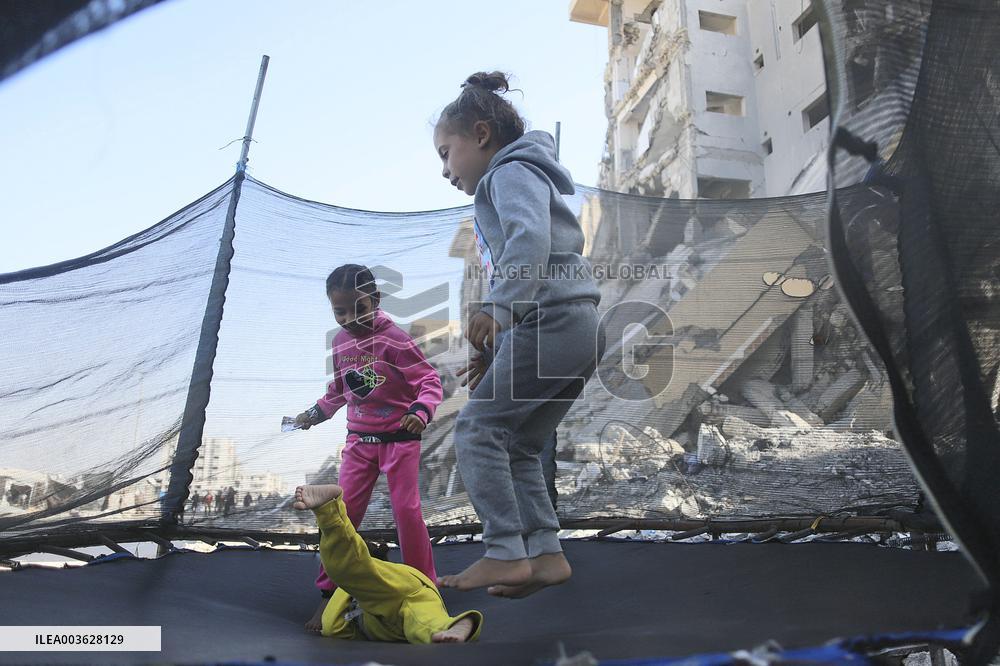 Children Entertain Amid Ruins - Gaza