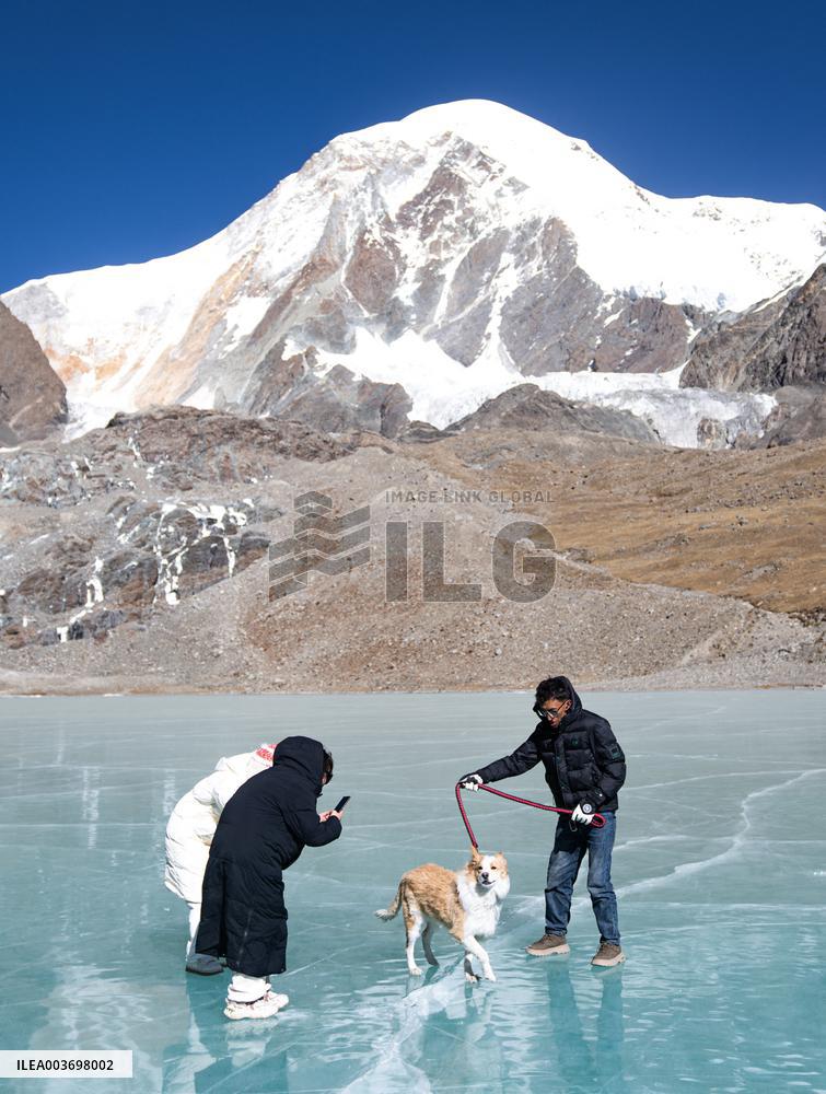 Icy Lake And The Mount Qungmknag - China
