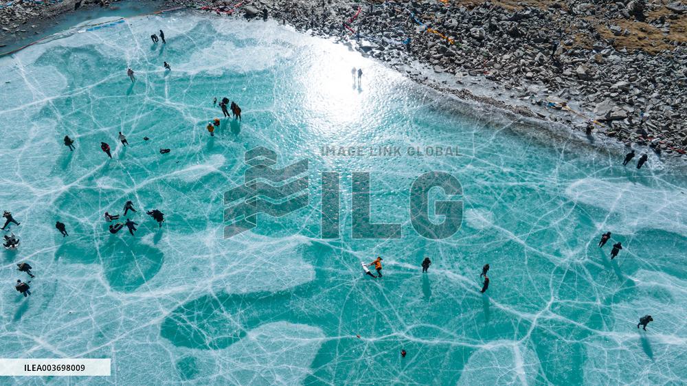 Icy Lake And The Mount Qungmknag - China