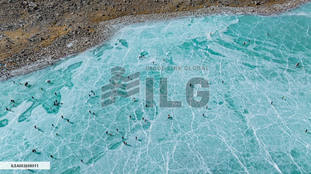 Icy Lake And The Mount Qungmknag - China