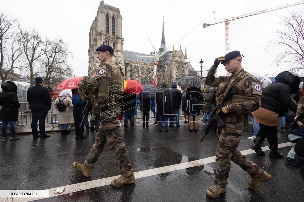 People attend the first mass outside Notre Dame Cathedral - Paris