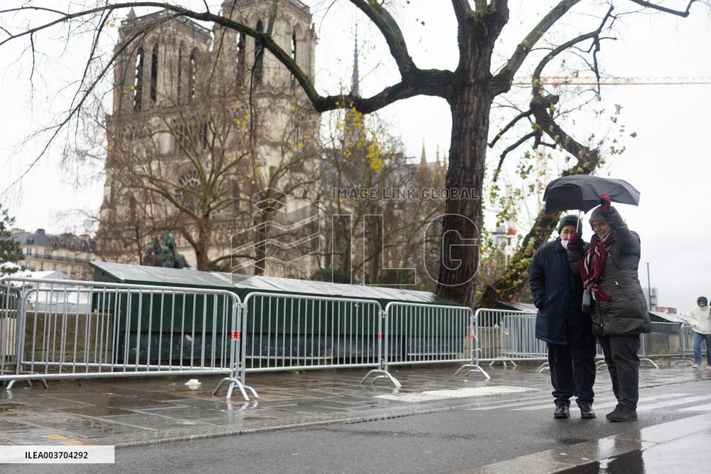 People attend the first mass outside Notre Dame Cathedral - Paris