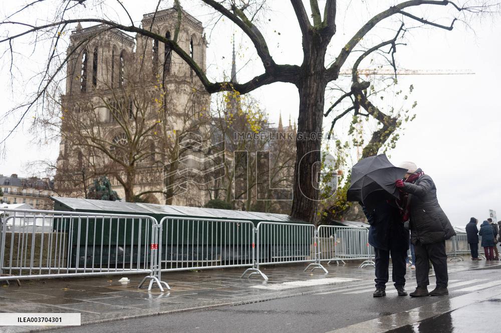 People attend the first mass outside Notre Dame Cathedral - Paris