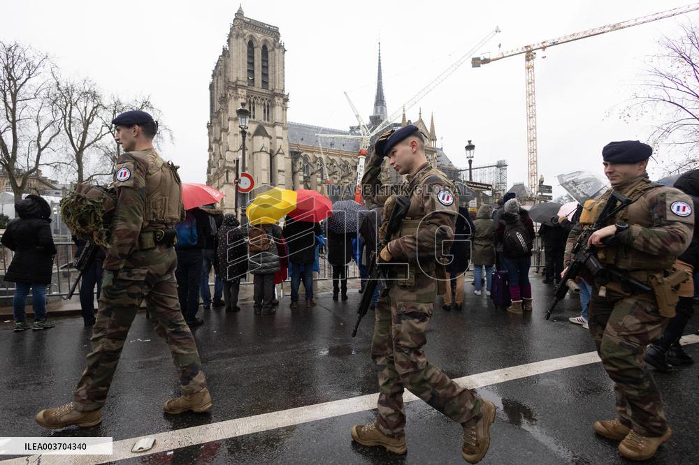 People attend the first mass outside Notre Dame Cathedral - Paris