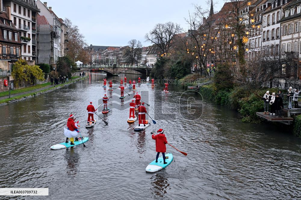 Santa Clauses Parade on Paddleboards - Strasbourg
