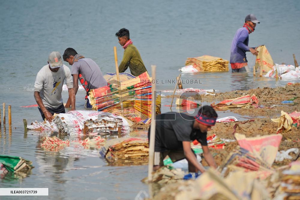 Cement Bags Washed In The Heavy Polluted Surma River - Bangladesh