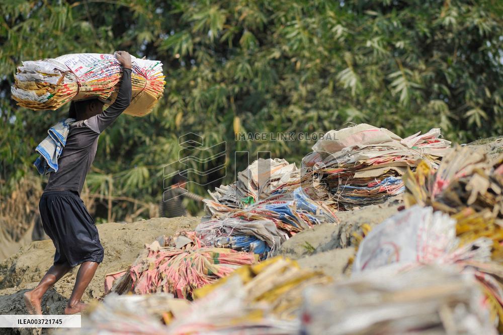 Cement Bags Washed In The Heavy Polluted Surma River - Bangladesh