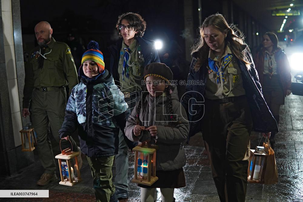 Plast scouts bring Peace Light of Bethlehem to Kyiv