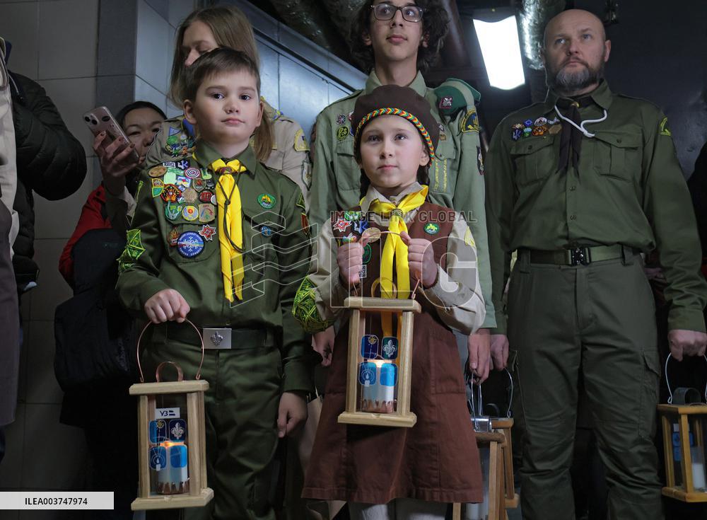 Plast scouts bring Peace Light of Bethlehem to Kyiv