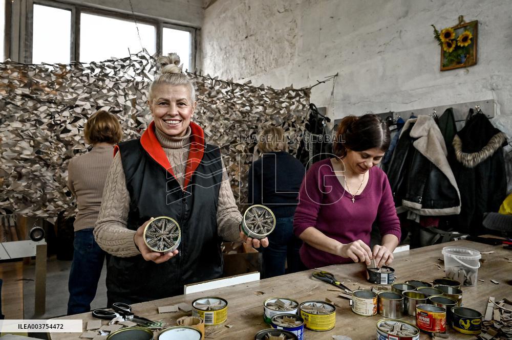 Volunteers make trench candles for soldiers in Zaporizhzhia
