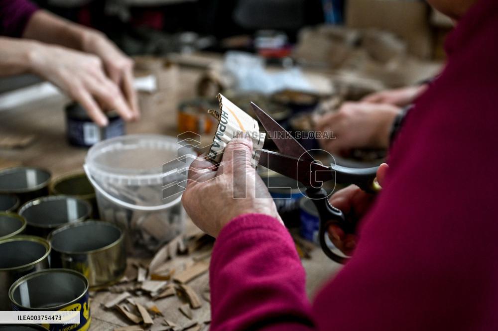 Volunteers make trench candles for soldiers in Zaporizhzhia