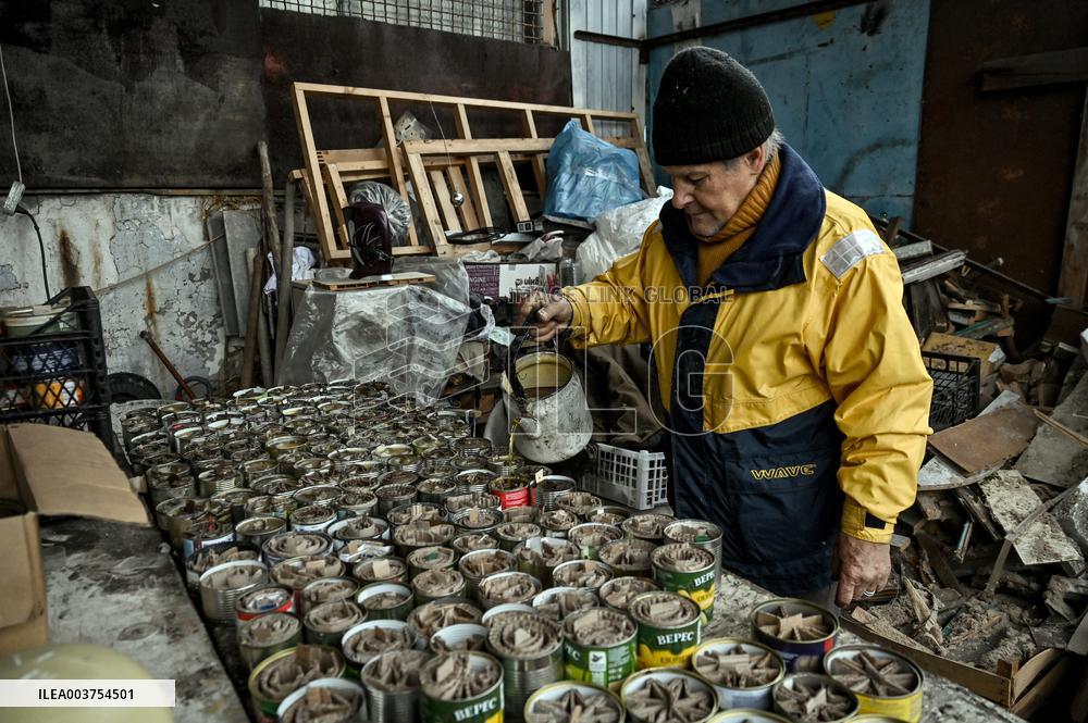 Volunteers make trench candles for soldiers in Zaporizhzhia