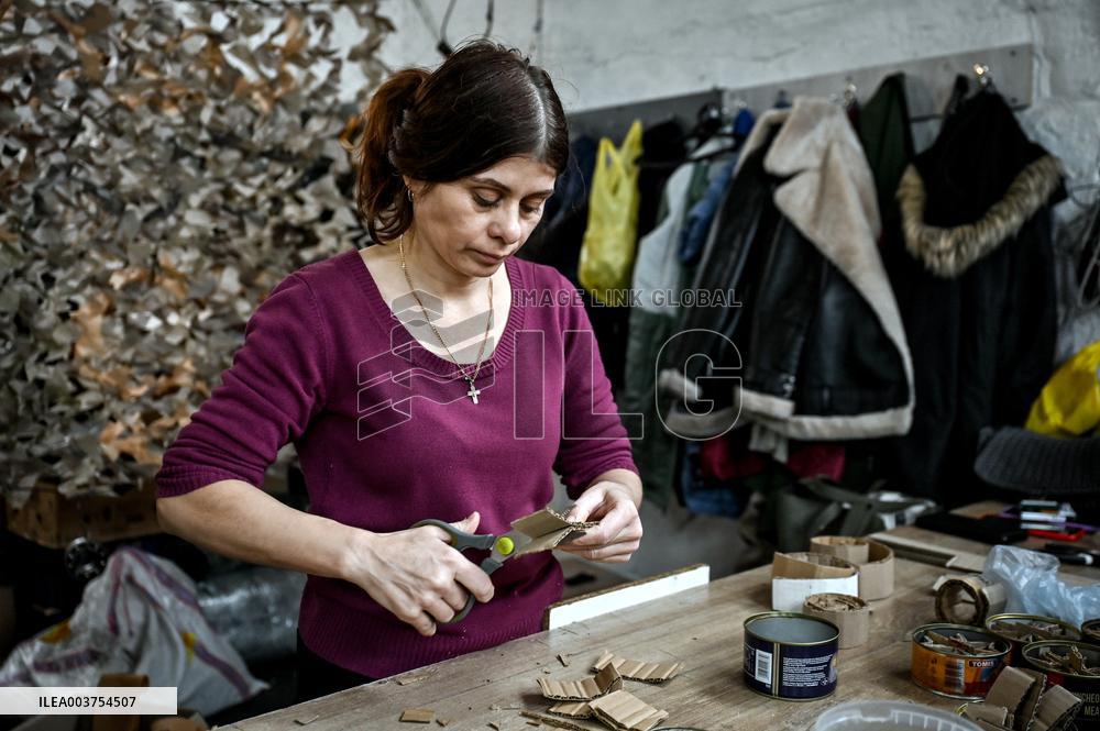 Volunteers make trench candles for soldiers in Zaporizhzhia