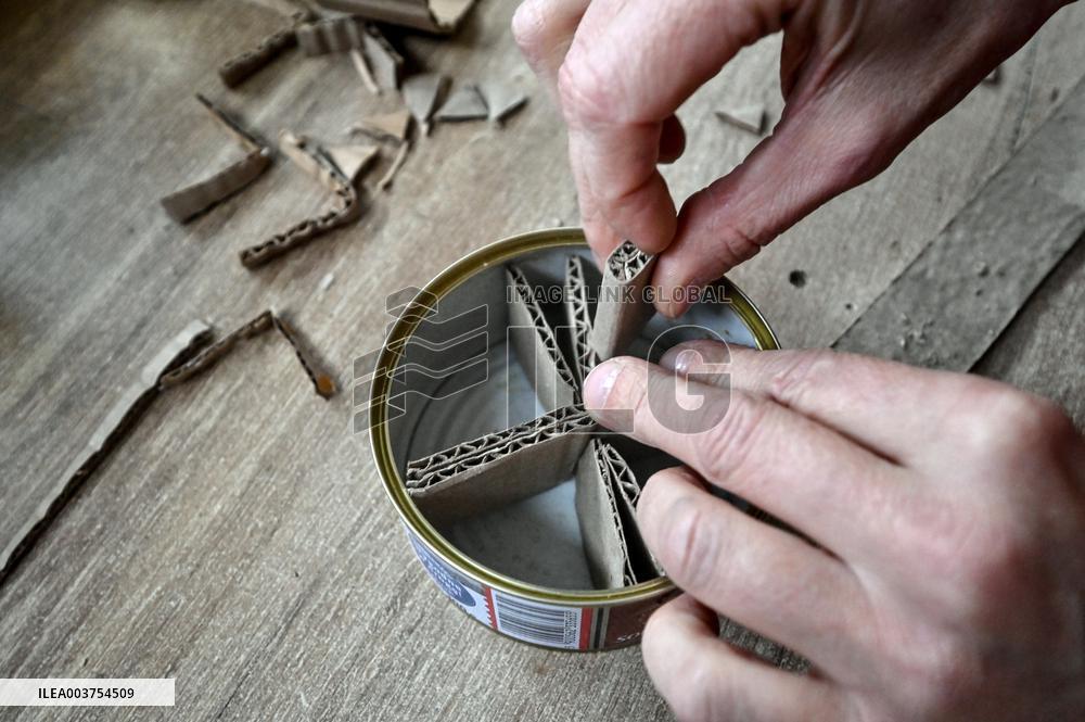 Volunteers make trench candles for soldiers in Zaporizhzhia