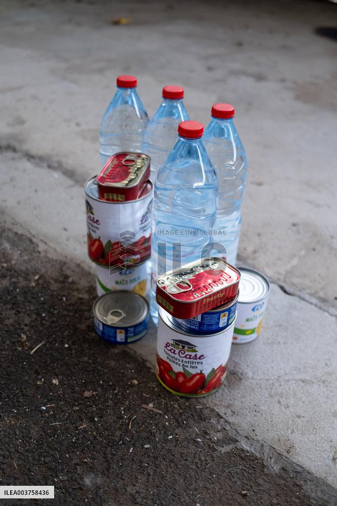 People Wait For Water And Food Distribution - Mayotte