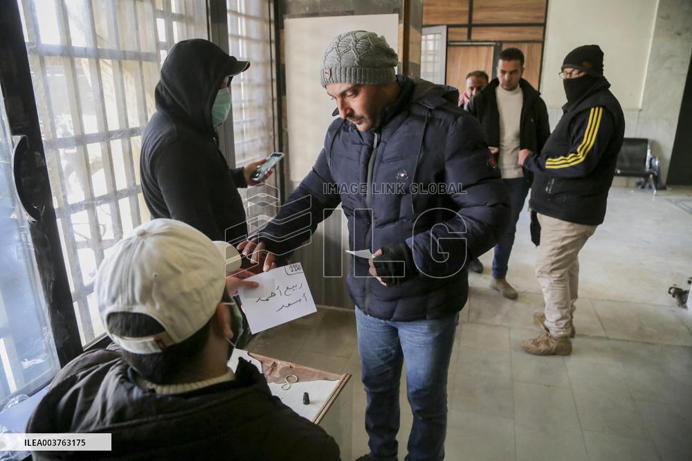 Long queues outside settlement center for temporary protection cards - Syria