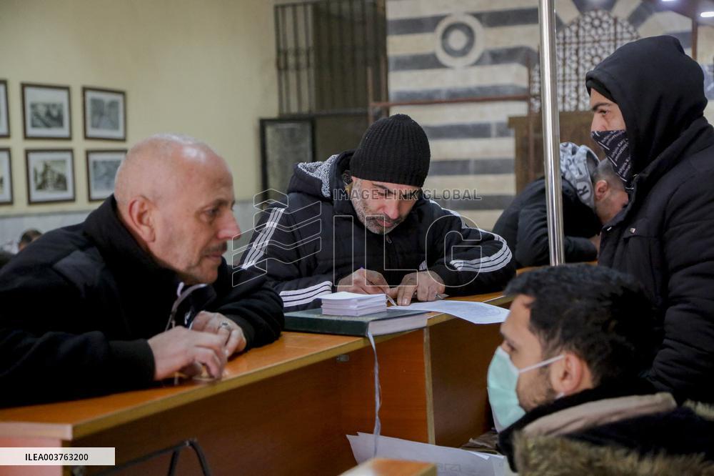 Long queues outside settlement center for temporary protection cards - Syria