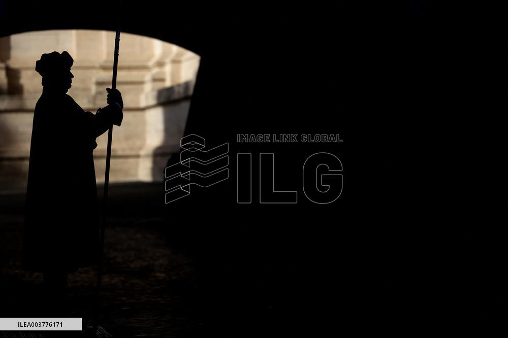 Pilgrims pass through the Holy Door