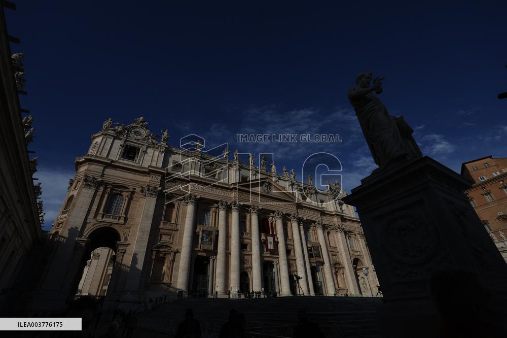 Pilgrims pass through the Holy Door