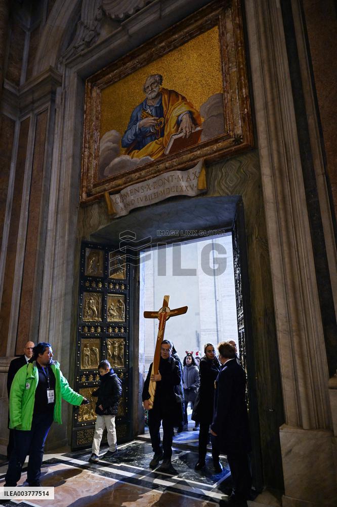 Pilgrims Walk Through The Holy Door Of St. Peter's Basilica - Vatican