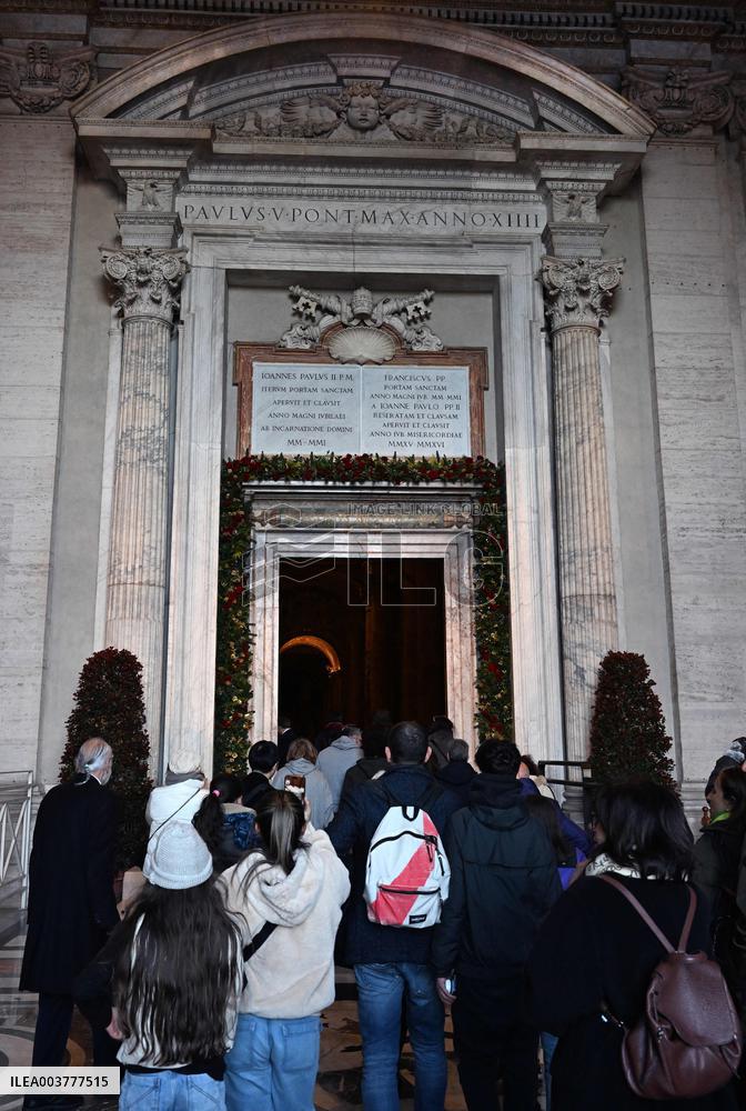 Pilgrims Walk Through The Holy Door Of St. Peter's Basilica - Vatican