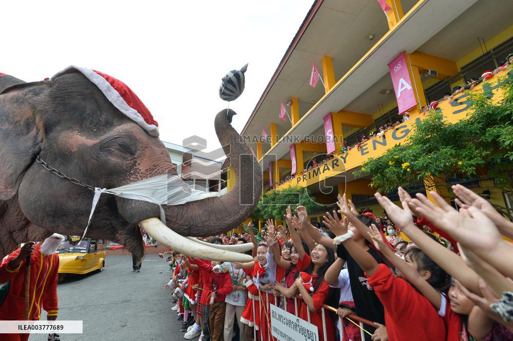 An Elephant Helps Distribute Presents To Students - Thailand