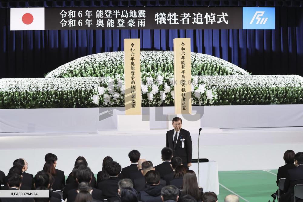 Memorial ceremony for quake, torrential rain victims