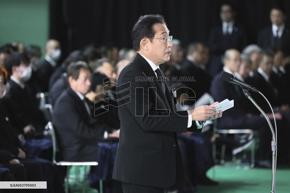Memorial ceremony for quake, torrential rain victims