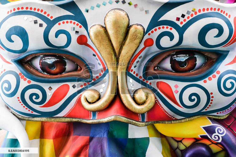 Artisans finish floats for Carnival parade of Blacks and Whites Carnival