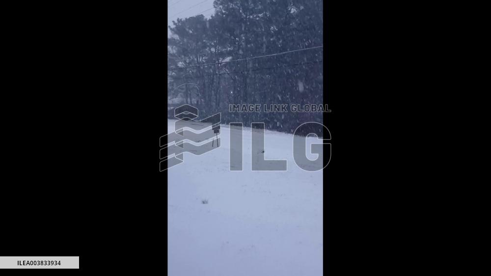 US: Major Winter Storm Sweeps Across South, Prompting States Of Emergency 7