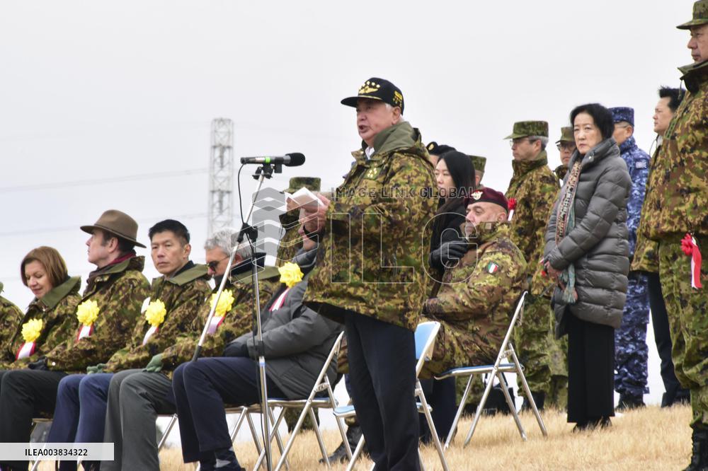 Japan defense minister inspect GSDF parachuting drill