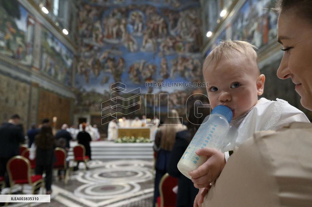 Pope Francis Conducts Baptisms - Vatican
