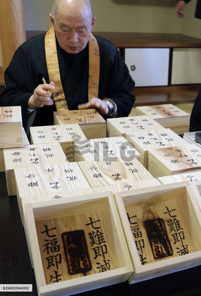 Making of wooden cups at Japanese temple