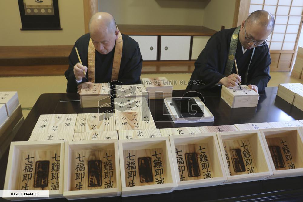 Making of wooden cups at Japanese temple