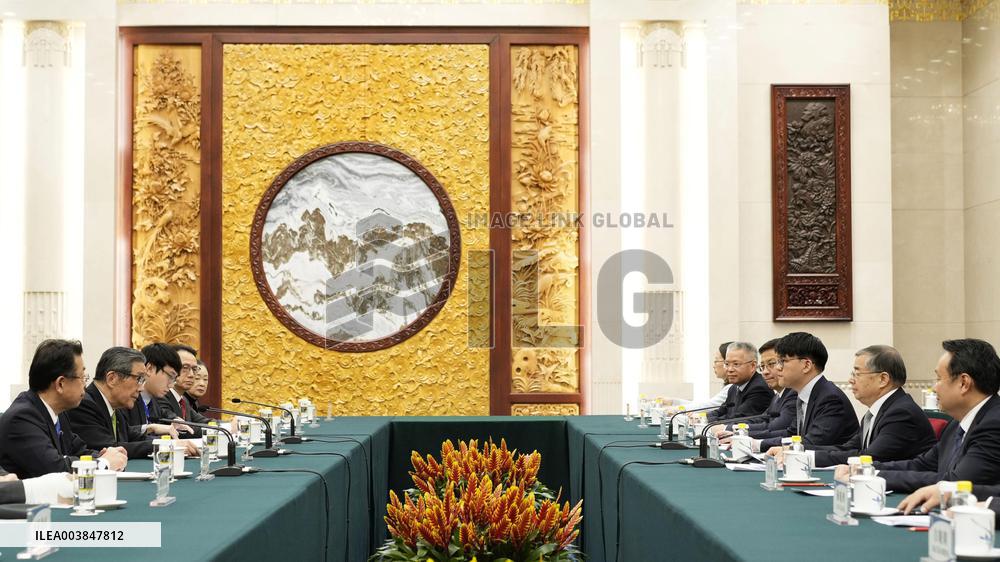 Japan ruling coalition lawmakers in Beijing