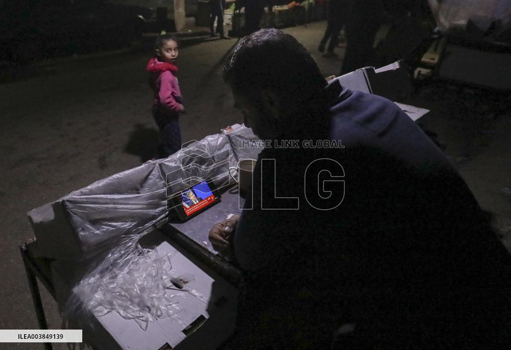 Displaced Residents Follow the News - Gaza