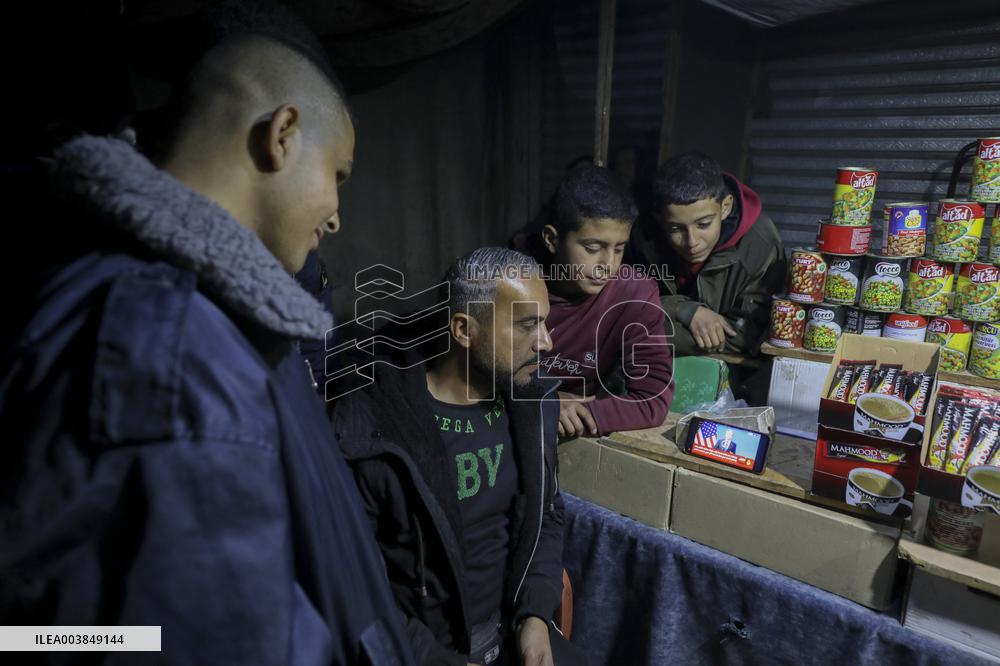 Displaced Residents Follow the News - Gaza