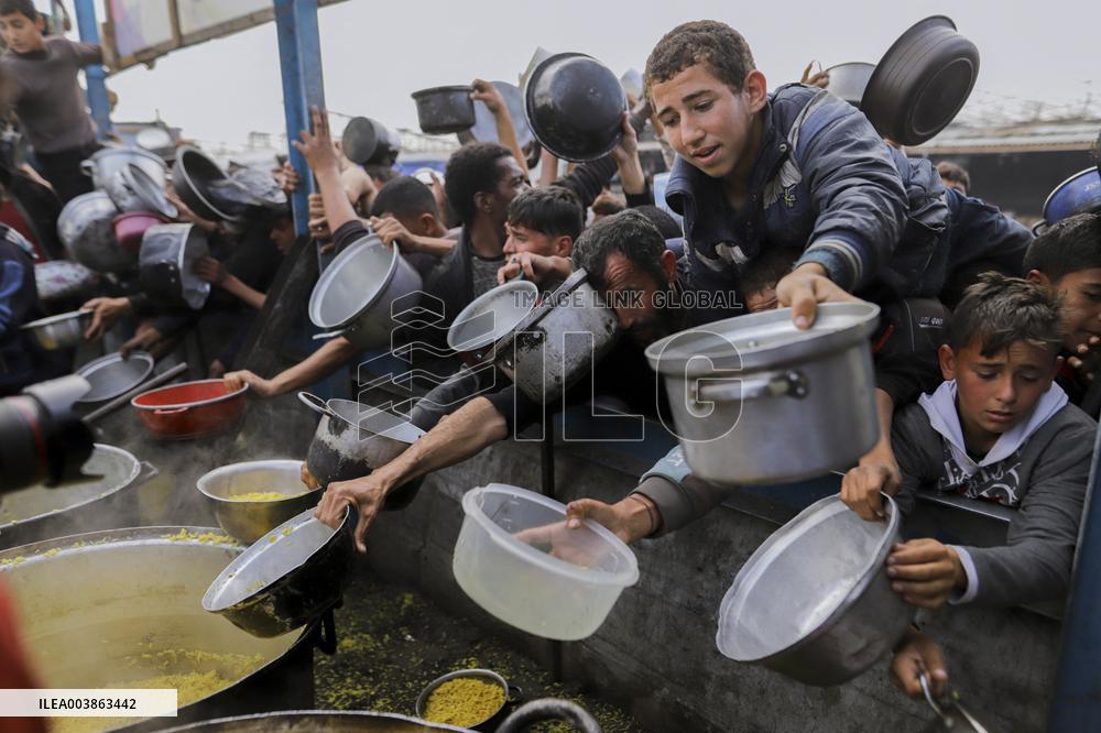 Waiting For Food In Gaza