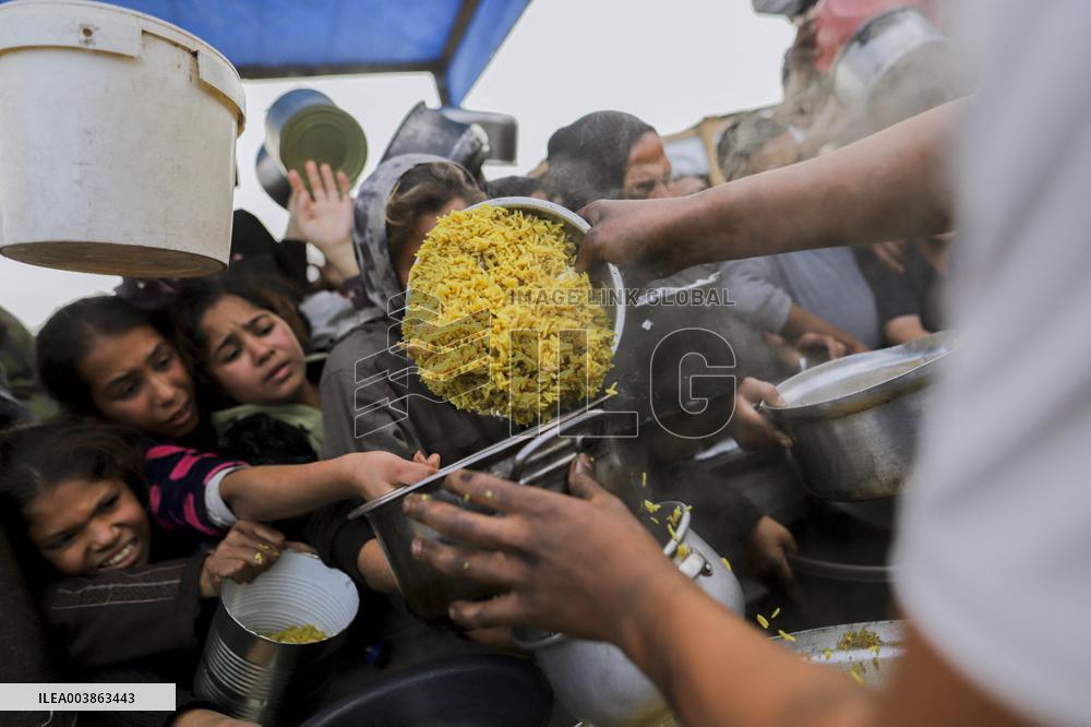 Waiting For Food In Gaza