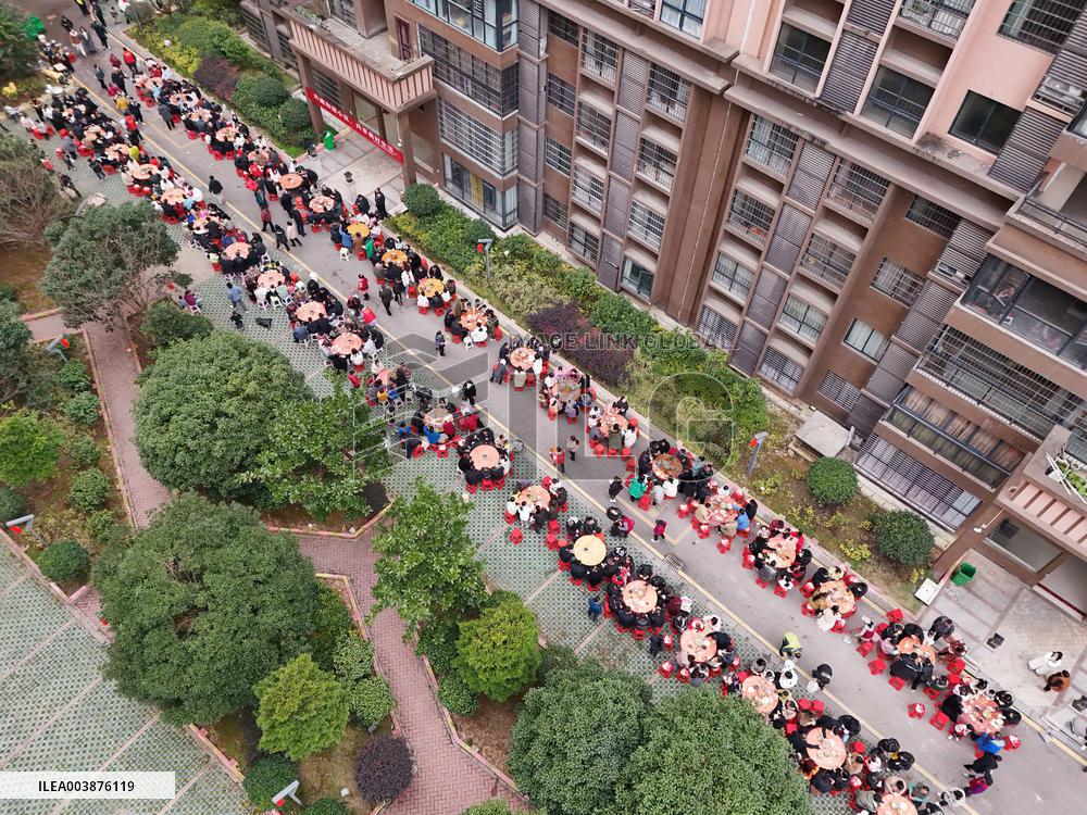 Community Owners Sit Around Tables and Eat Soup