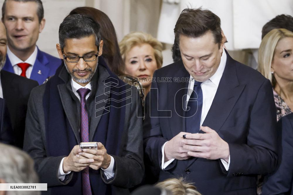 Elon Musk Holds His Phone At Trump Inauguration - DC